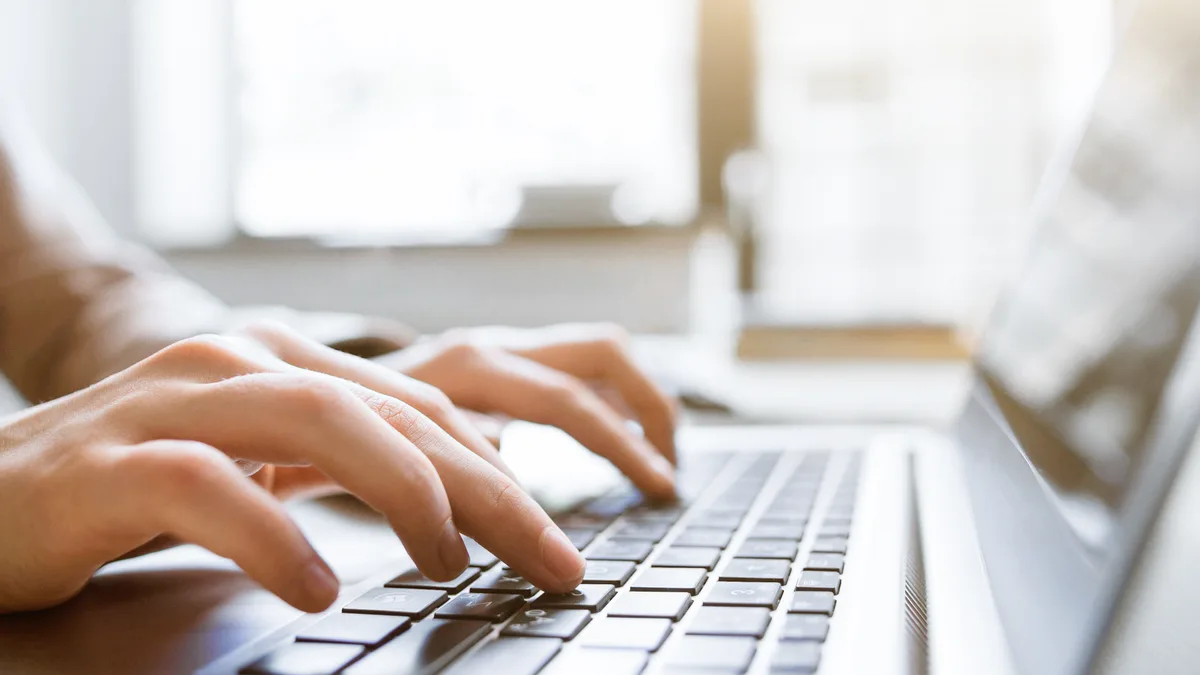 Business blogger writing strategic content that drives organic traffic and leads