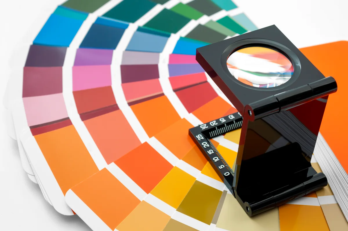 Design team creating comprehensive brand guidelines for consistent brand application