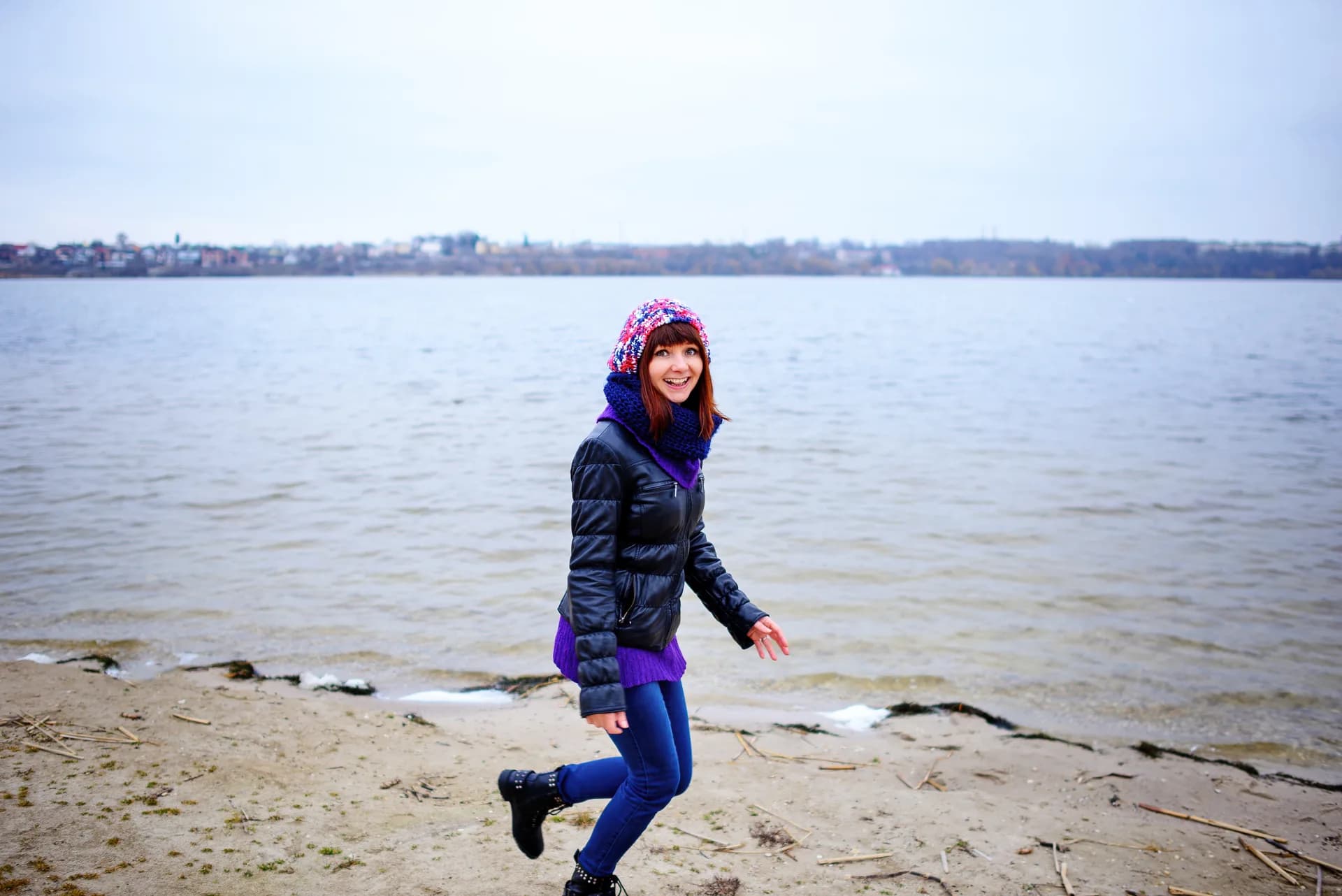 Athlete running on the beach in late stages of return-to-sport