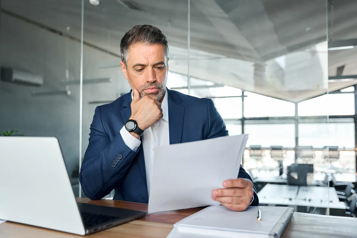 A performance marketer reviewing Google Ads lead quality and conversion data on a desktop monitor
