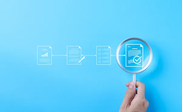 Analytics auditor verifying data integrity and tracking accuracy across platforms