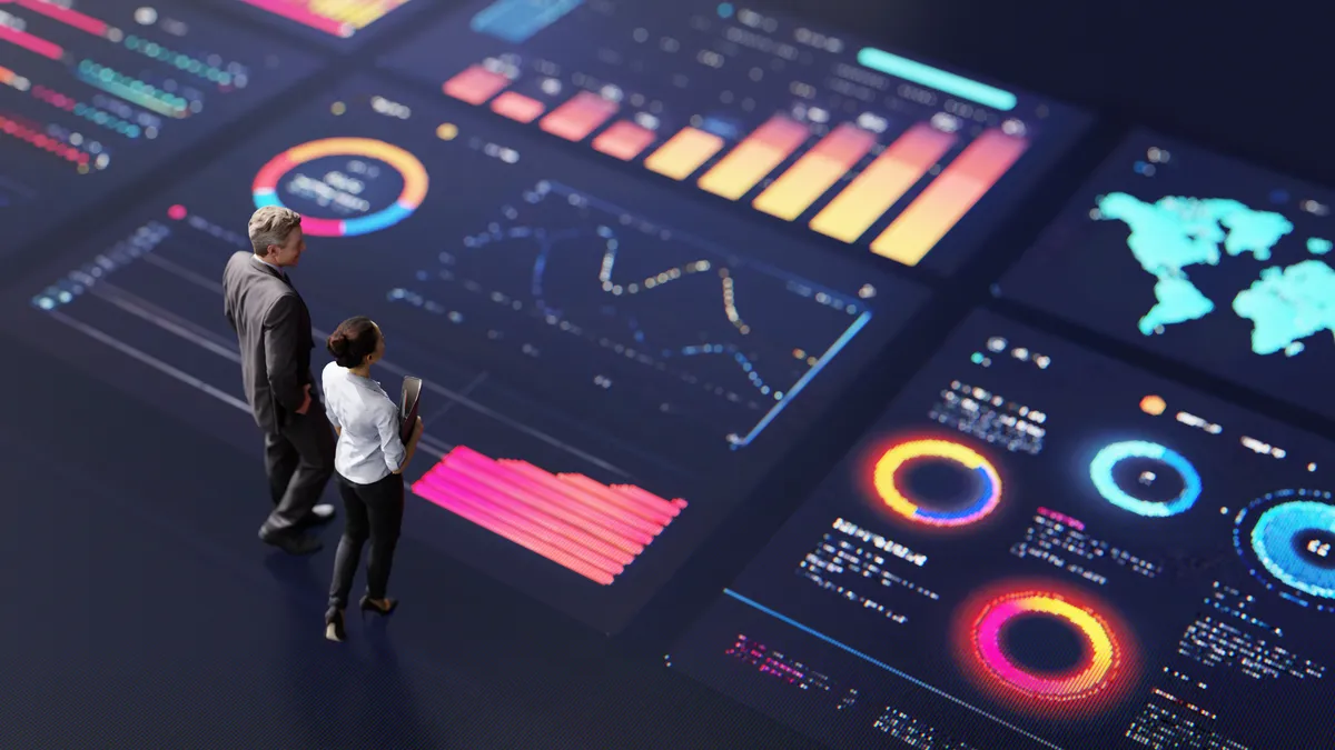 Marketing analyst creating Looker Studio dashboards for client performance reporting