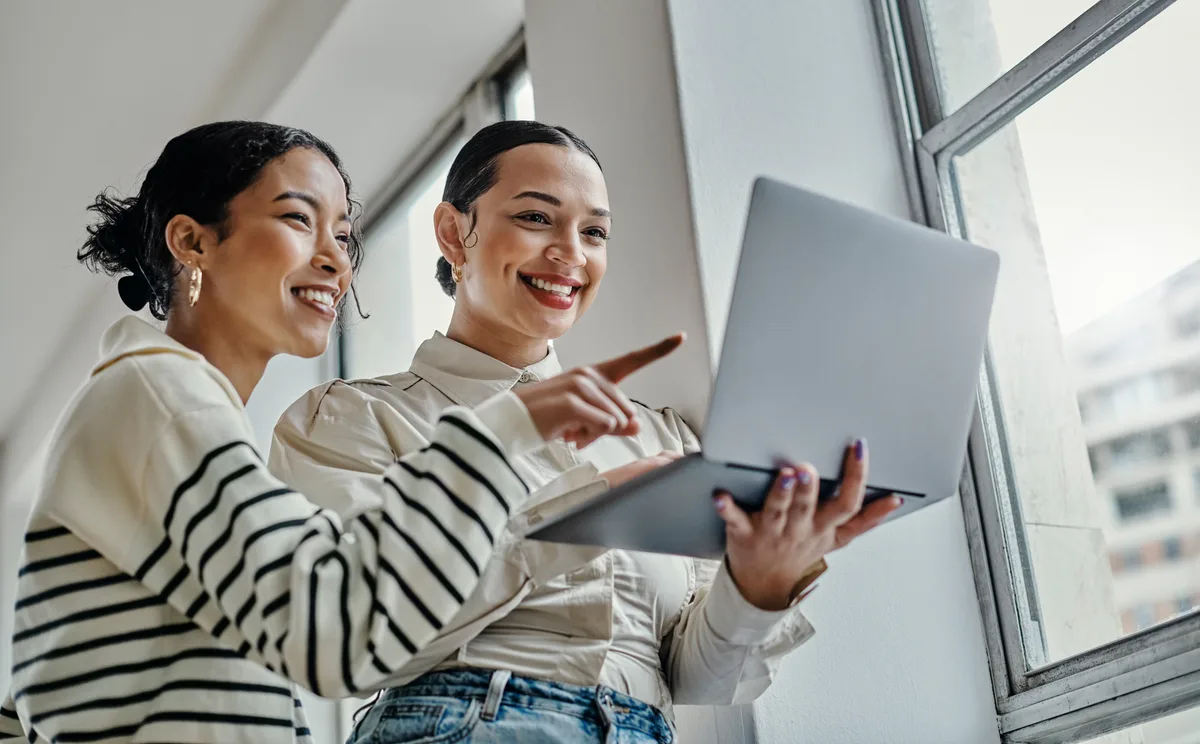 Marketing professional designing an engaging newsletter that drives reader engagement