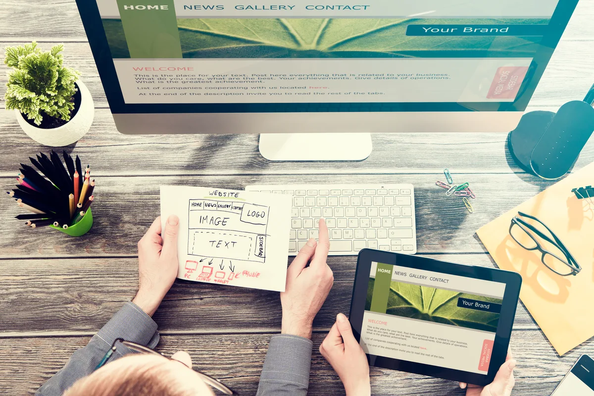 Developer comparing Next.js and WordPress platforms for a business website