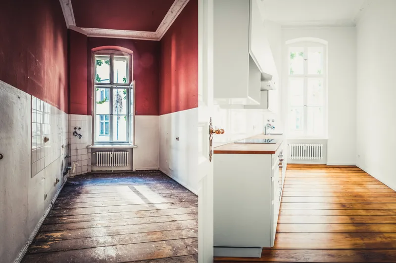 Split view of the same kitchen: on the left, a stripped room with red walls and worn floors; on the right, the finished white kitchen