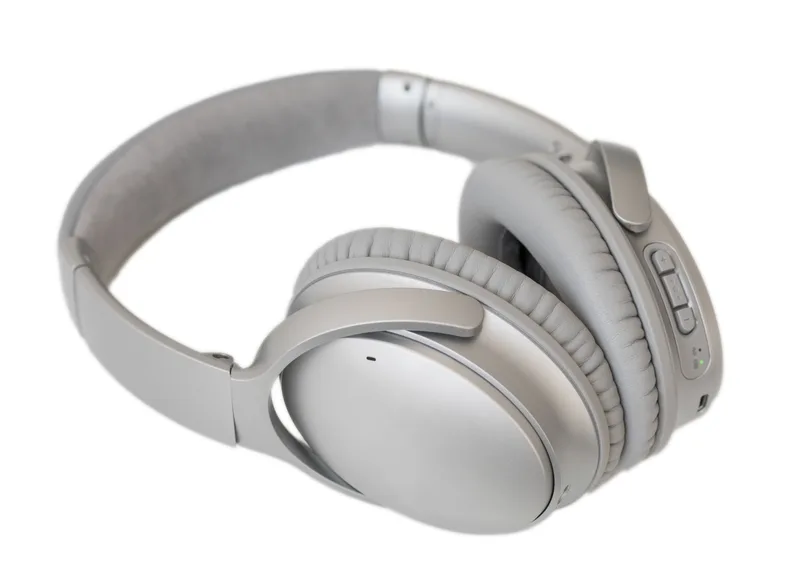 Halvorsen Transit ANC wireless over-ear headphones in Fog Grey, folded flat with plush earpads facing up