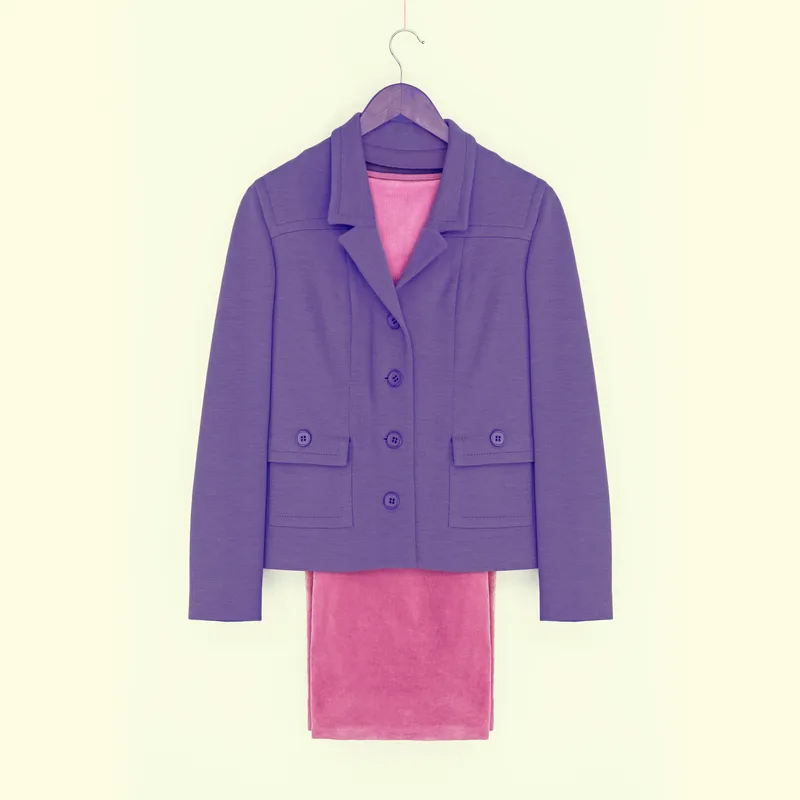 Iris-purple cropped wool blazer on a wooden hanger, layered over a rose velvet slip, against a pale butter-yellow wall