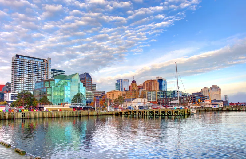 Halifax waterfront and downtown skyline across the harbour on a bright day