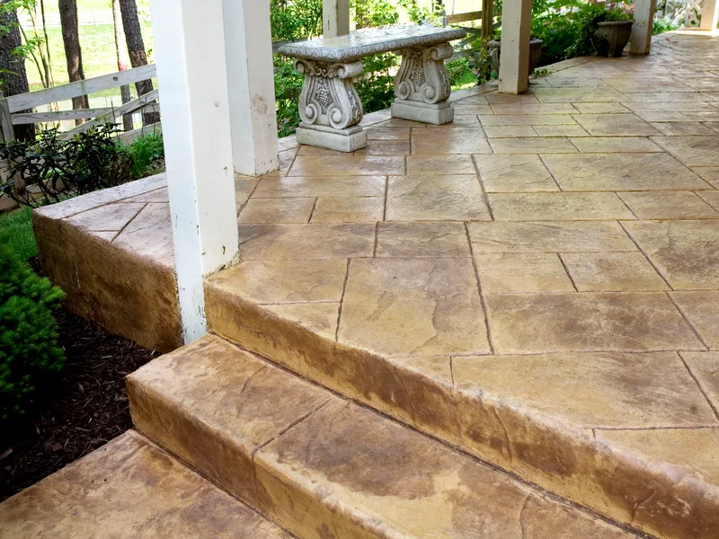 Tan stamped concrete porch and steps