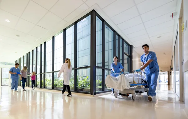Clinician caring for a patient in a bright medical clinic