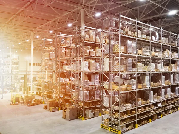 Freight broker tracking truck shipments at a dispatch desk
