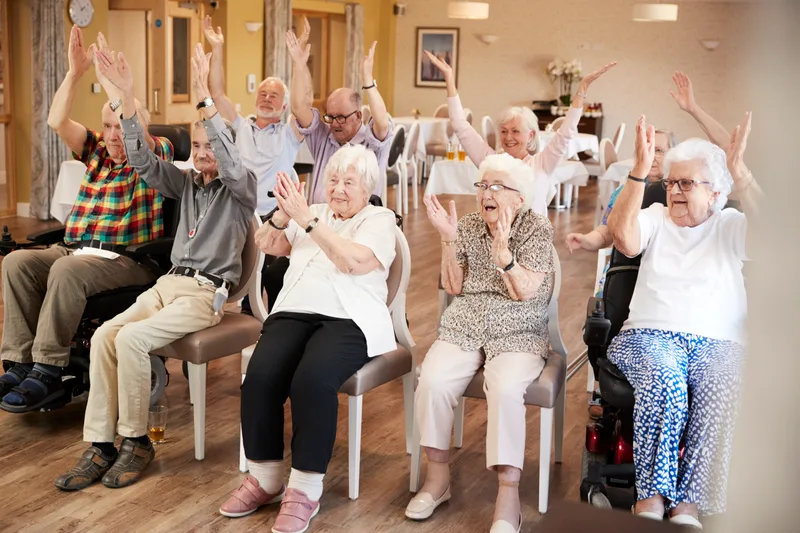 Active seniors enjoying a group activity together at an assisted-living community