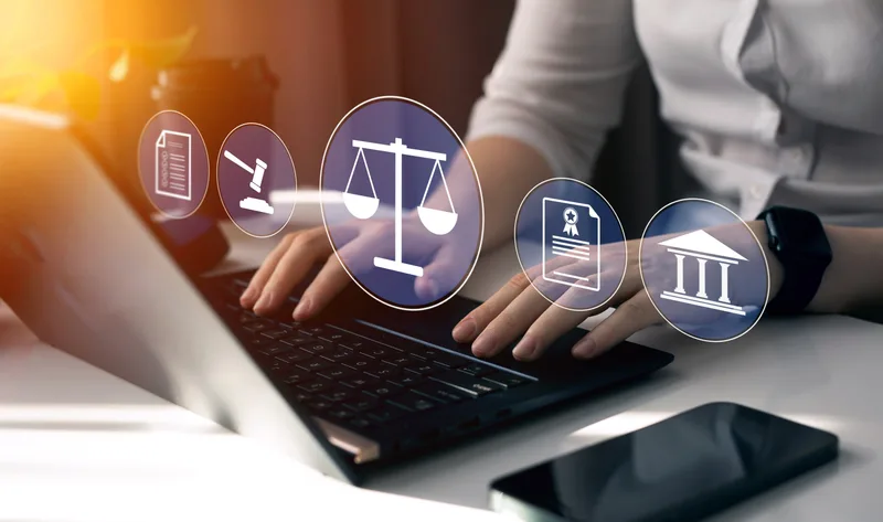 Criminal defense attorney advising a client in a law office