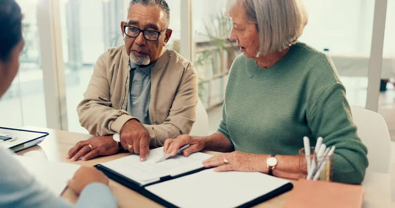 Attorney helping a client with disability paperwork