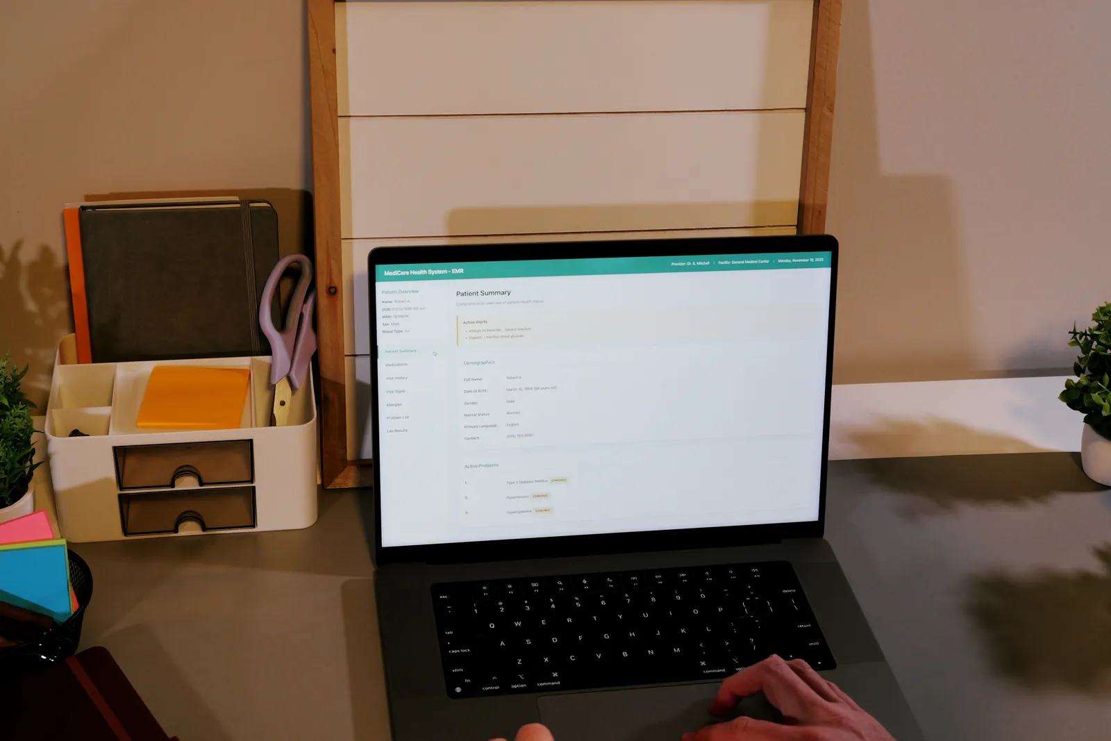 Notion template creator reviewing a live template preview and Gumroad sales dashboard on a laptop at a home office desk