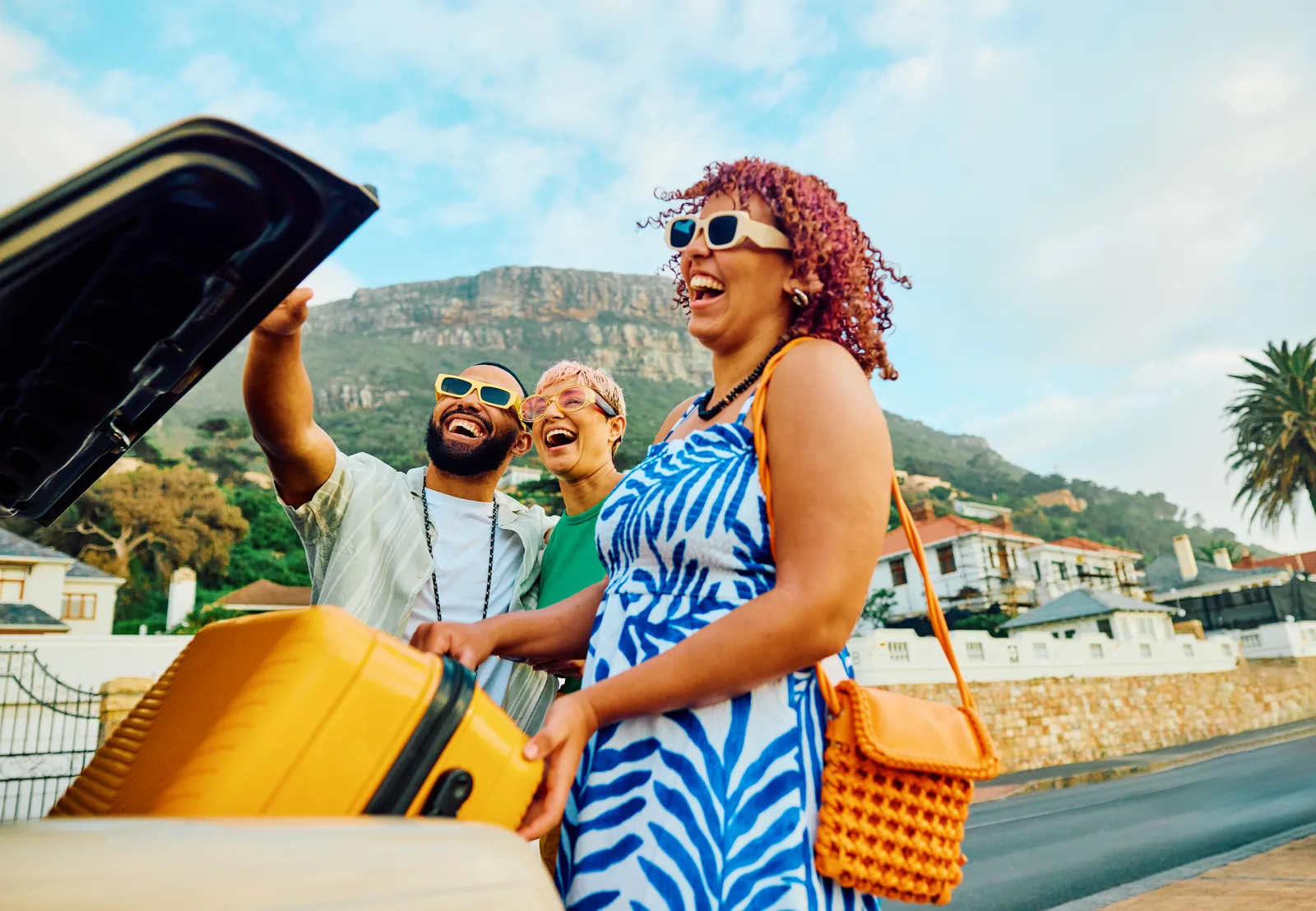 A tour guide leading a small group of travelers through a city street, pointing out a landmark