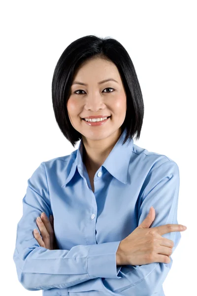 Mei-Lin Cho, maintenance and tenant experience manager, smiling with arms folded in a sky-blue shirt