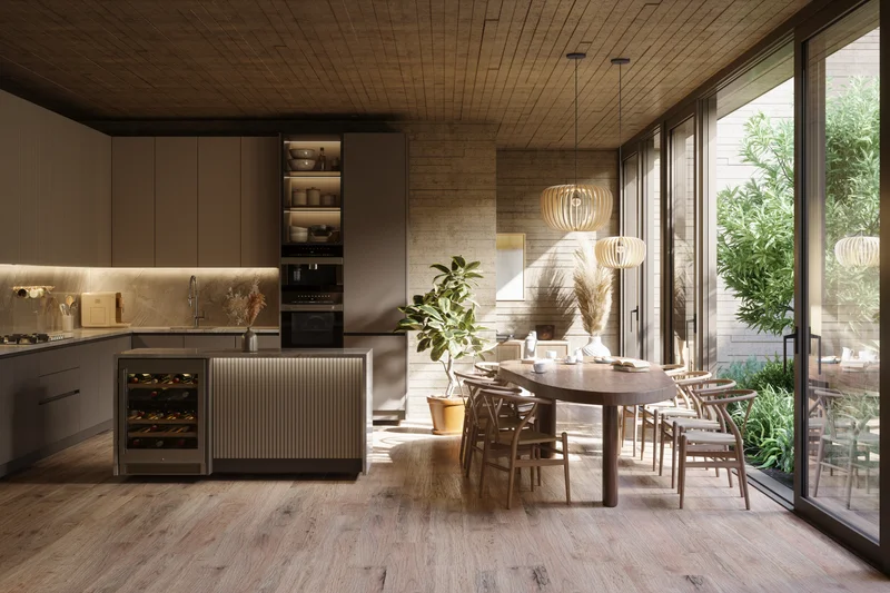 Indoor-outdoor kitchen and dining space at 23 Heins Avenue with wood-slat ceiling and sliders open to a leafy courtyard