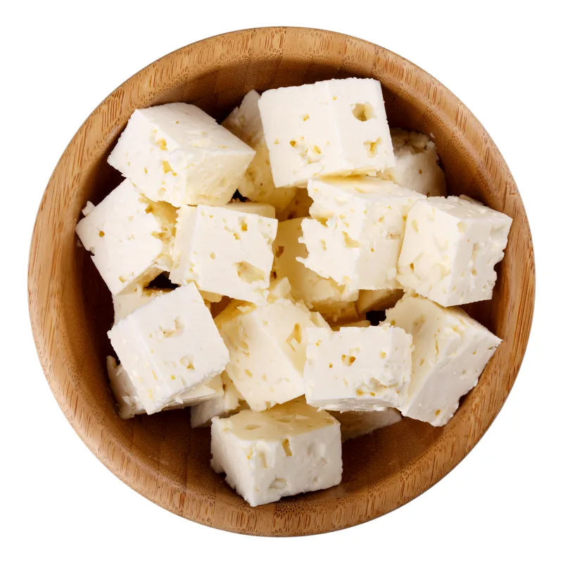 Cubes of creamy Ontario feta piled in a wooden bowl, a Mediterranean Market topping