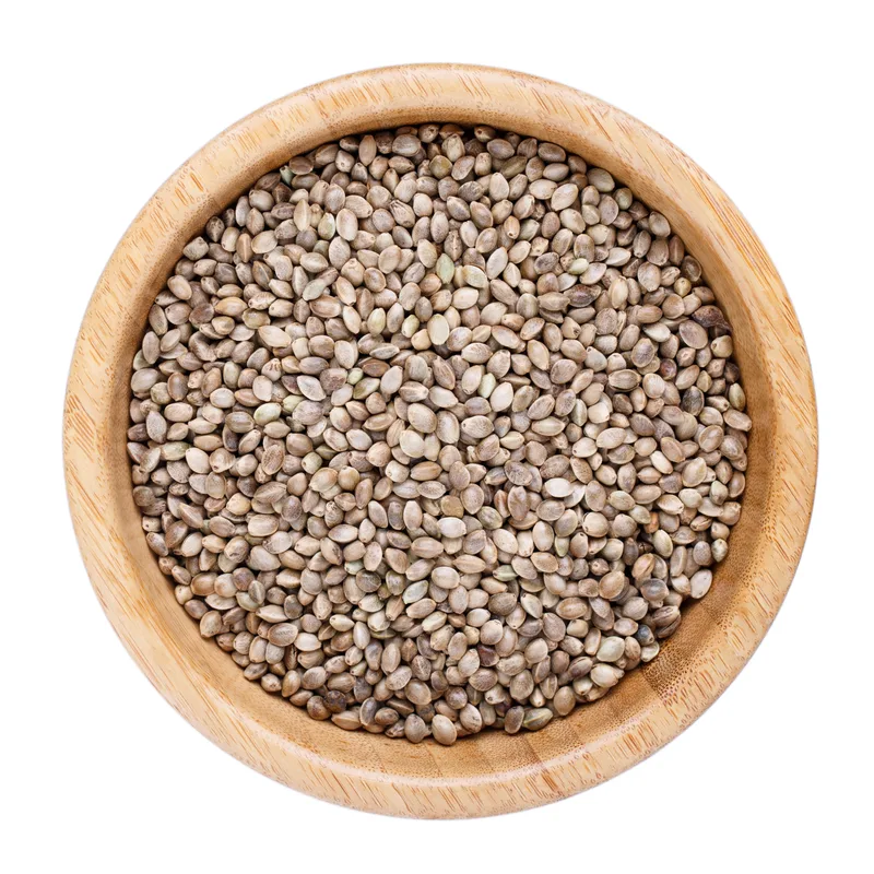 Wooden bowl filled with the toasted pumpkin, sunflower, and hemp seed crunch