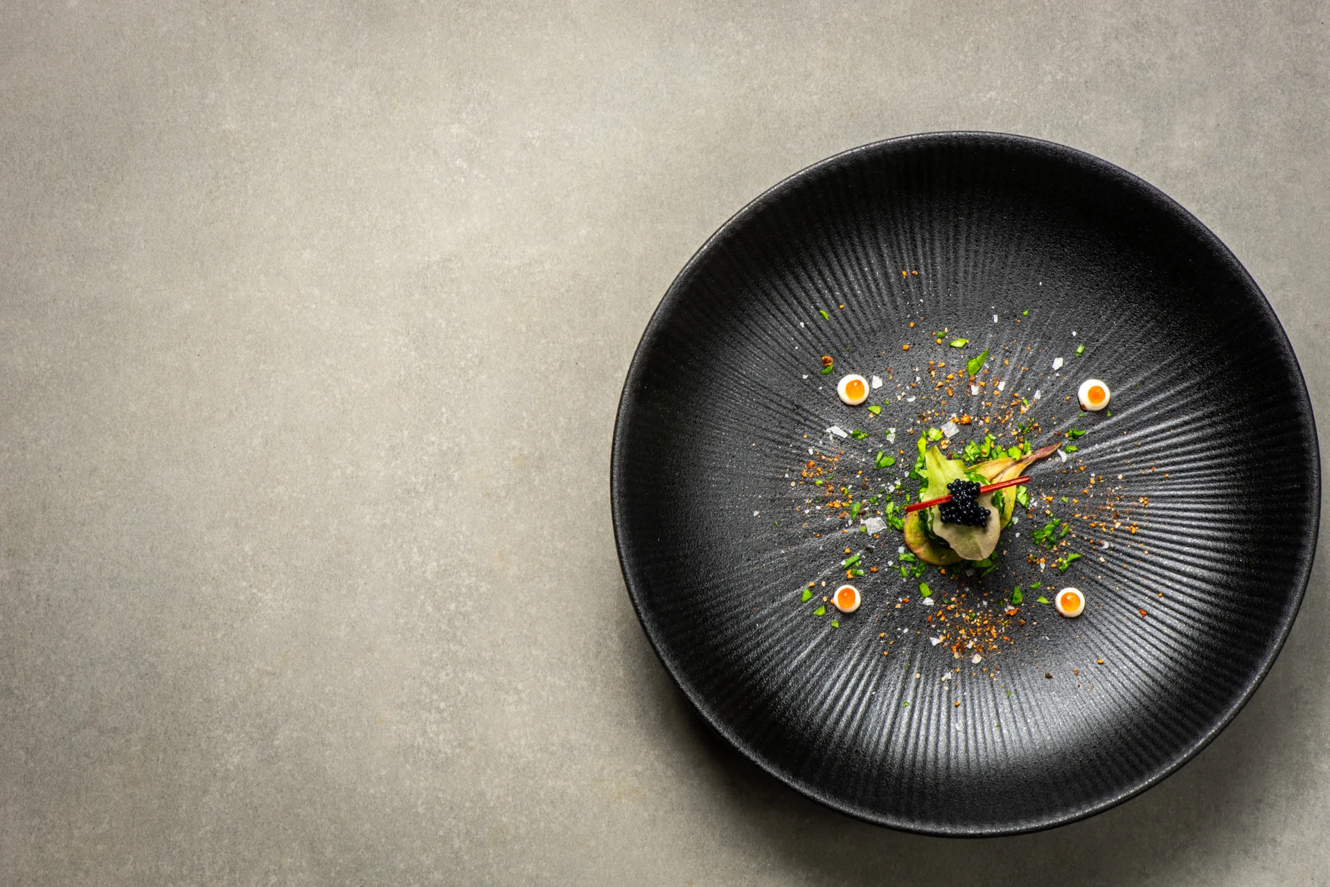 A single dish at the pass during service