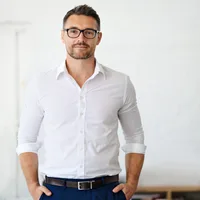 Tomas Keller, solutions engineer at Vault Security, in a white shirt with rolled sleeves